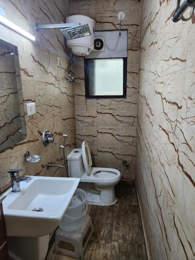 Hotel Cozy Cave New Delhi Extérieur photo
